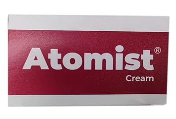 Atomist Cream Logo